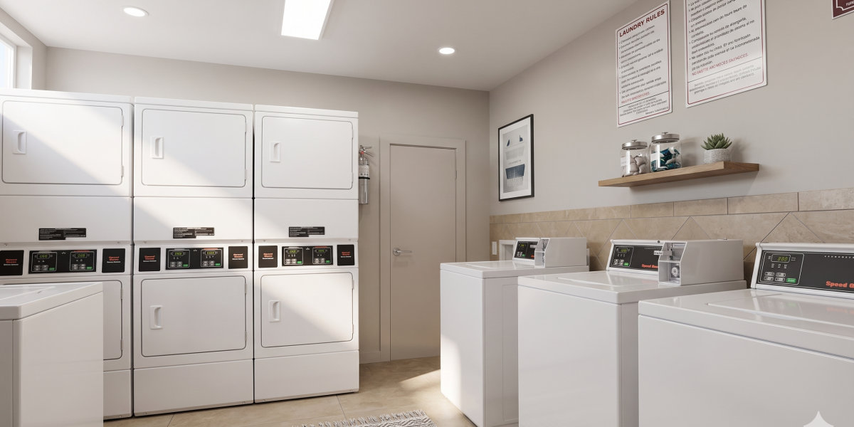 On-site laundry room with washers and dryers at Falls of Wilcrest